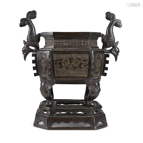 An archaistic patinated bronze incense burner with bird-form handles, Ding, and stand, in ming dynasty style, 19th century or earlier