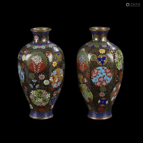 A pair of small Japanese cloisonne hexagonal vases decorated with floral roundels, meiji period