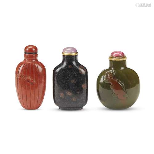 Group of two jasper and one hardstone snuff bottles,