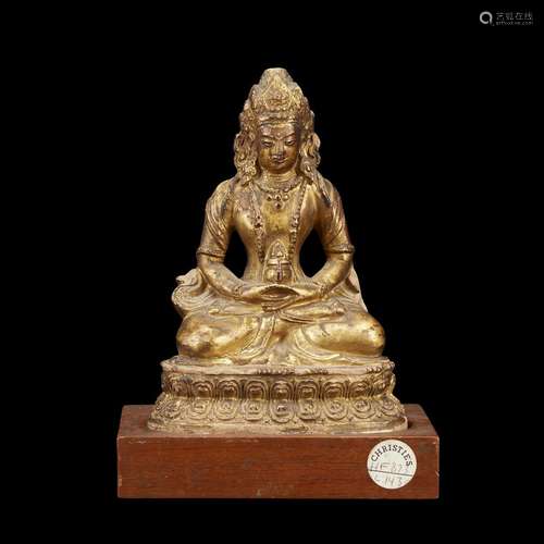 A Sino-Tibetan gilded terracotta figure of Amitayus Buddha,