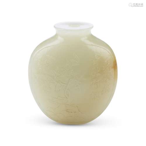 A Chinese carved celadon jade snuff bottle, Qing Dynasty