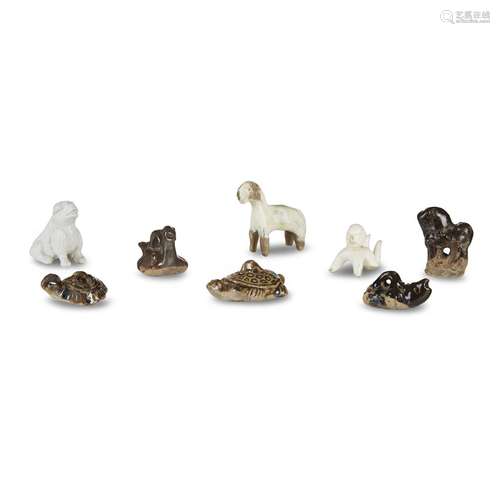 Eight small Chinese molded and modeled figures of animals and a boy, Possibly Song dynasty and later