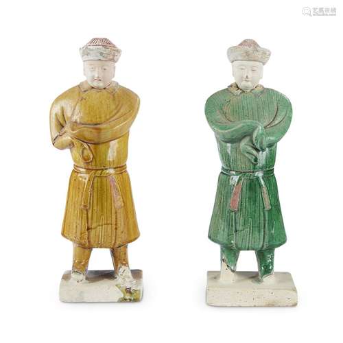 Two painted and glazed pottery figures of standing attendants, ming dynasty