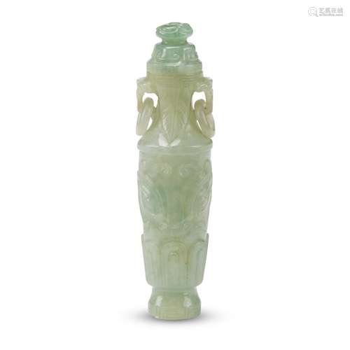 A small Chinese carved jadeite vase and cover,