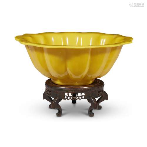 A large Chinese molded opaque yellow glass twelve-lobed bowl,