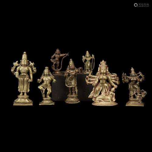 Group of seven Indian copper alloy figures of deities, 19th century and earlier