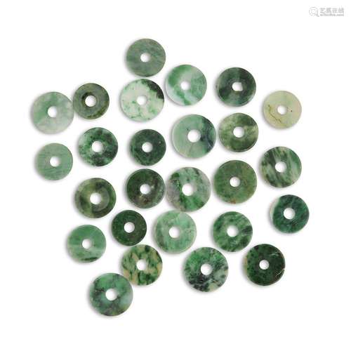 A group of twenty-six assorted Chinese jadeite discs,