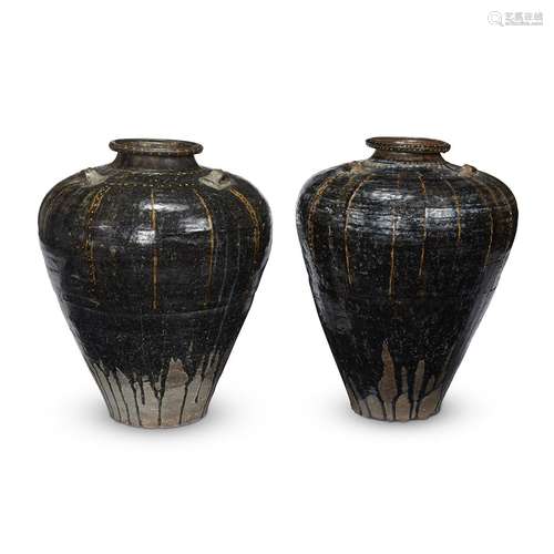 An associated pair of large brown-glazed Martaban jars, Probably 14th/15th century