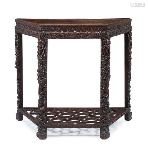 A Chinese carved hardwood demi-lune table, qing dynasty