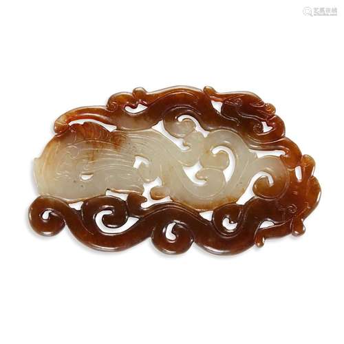 A Chinese white and brown jade 'qilong and phoenix' pendant, qing dynasty, 18th/19th century