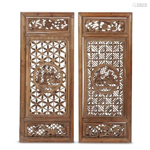 A pair of Chinese carved wood lattice-work screens, Qing dynasty