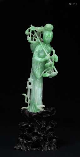 A natural jadeite figure carving of magu