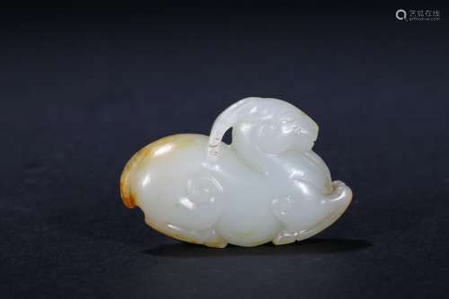 A white jade carved ram