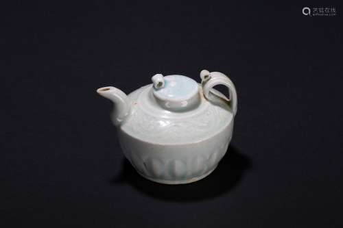 A white and celadon glazed ceramic ewer