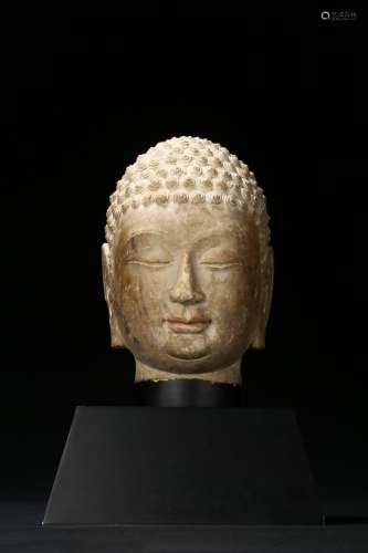 A white marble carved head of bodhisattva