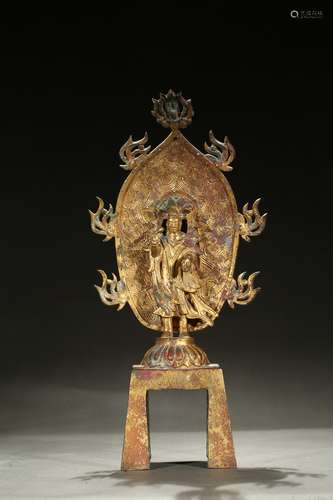 A gilt bronze figure of standing bodhisattva