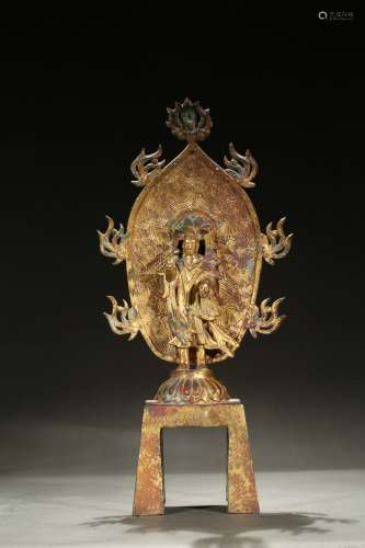 A gilt bronze figure of standing bodhisattva