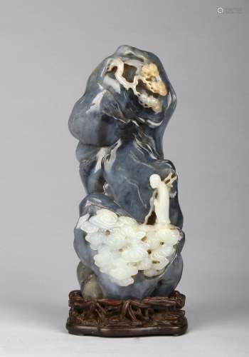A white and grey jade 'immortal' mountain boulder