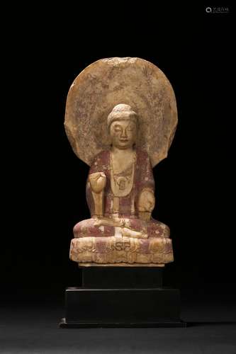 A painted seated marble carved bodhisattva