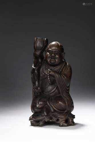 A rosewood carving of monk