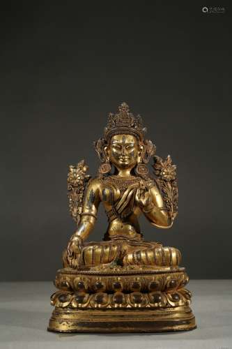 A gilt-bronze figure of bodhisattva