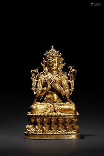 A gilt-bronze figure of seated bodhisattva