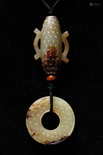A set of archaic jade cylinder and disc pendant