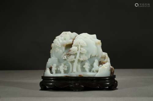 A white jade carved landscape boulder
