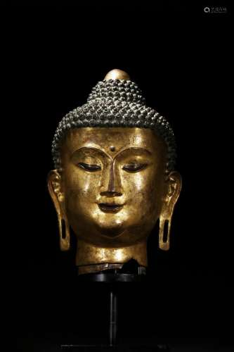 A large gilt-bronze head of bodhisattva