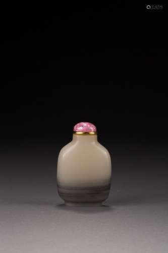 A white and grey jade snuff bottle