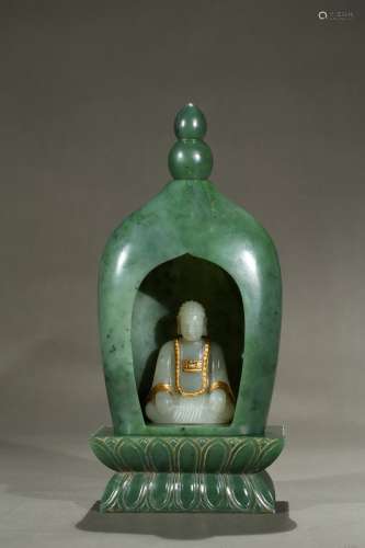 A spinach green jade pagoda and white jade buddha