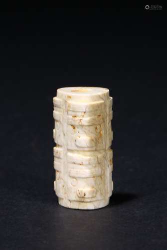 A small jade cylindrical ornament