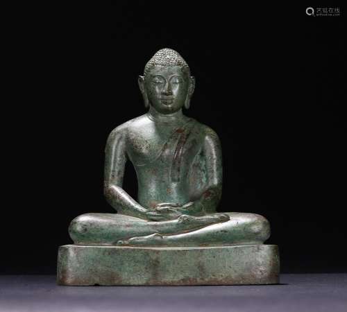 A bronze figure of buddha