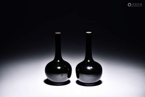 A pair of mirror black glazed vases