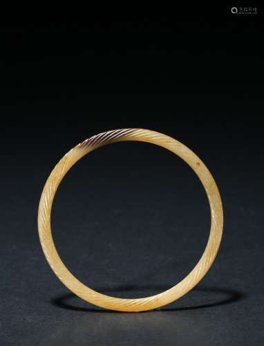 A large white jade twisted-rope ring