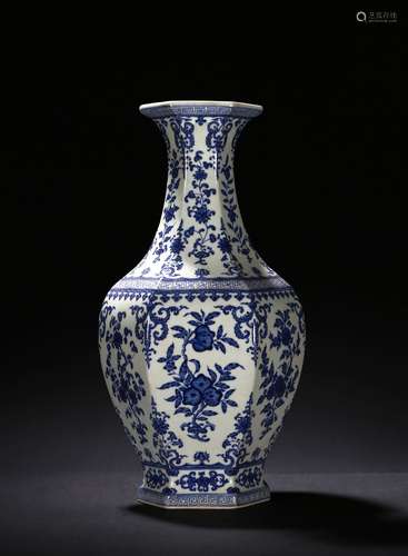 A blue and white hexagonal vase