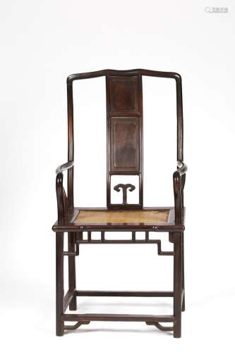 A Chinese rosewood yoke back armchair