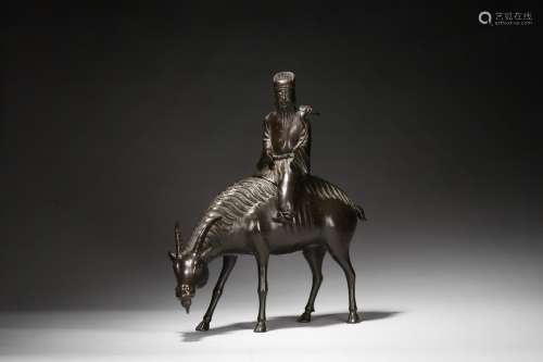 A bronze 'immortal on ram' incense burner