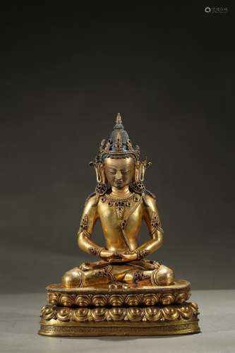 A gilt-bronze figure of Amitabha