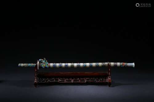 A silver and enameled jade inset sword