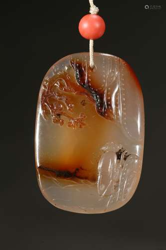 A suzhou agate 'literati' pendant