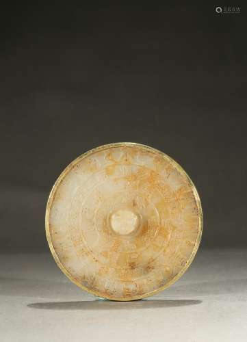 A gilt or gold and jade 'buddhist script' plate