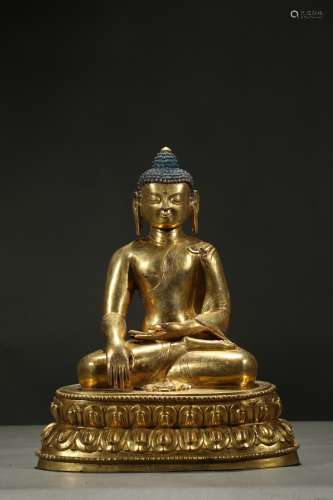 A gilt-bronze figure of shakyamuni