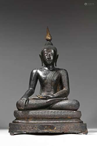 A large parcel gilt figure of seated buddha