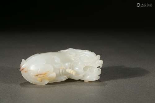 A white jade buddhist lion carving