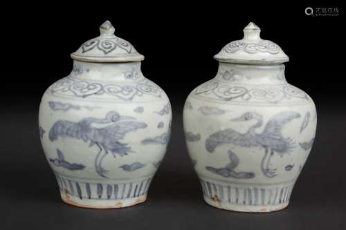 A pair of blue and white 'Cranes' small jars with covers