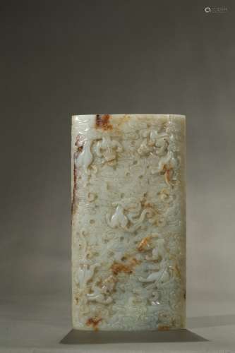 A white and russet jade 'chilong' armrest