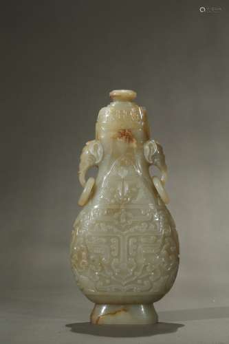 A white jade 'archaistic' elephant handle vase