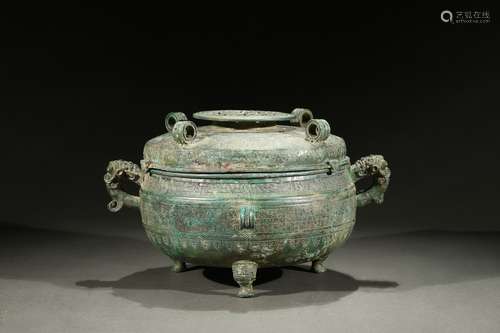 A bronze ritual tripod food vessel Dun