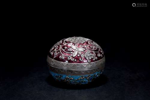 An enamelled silver box and cover